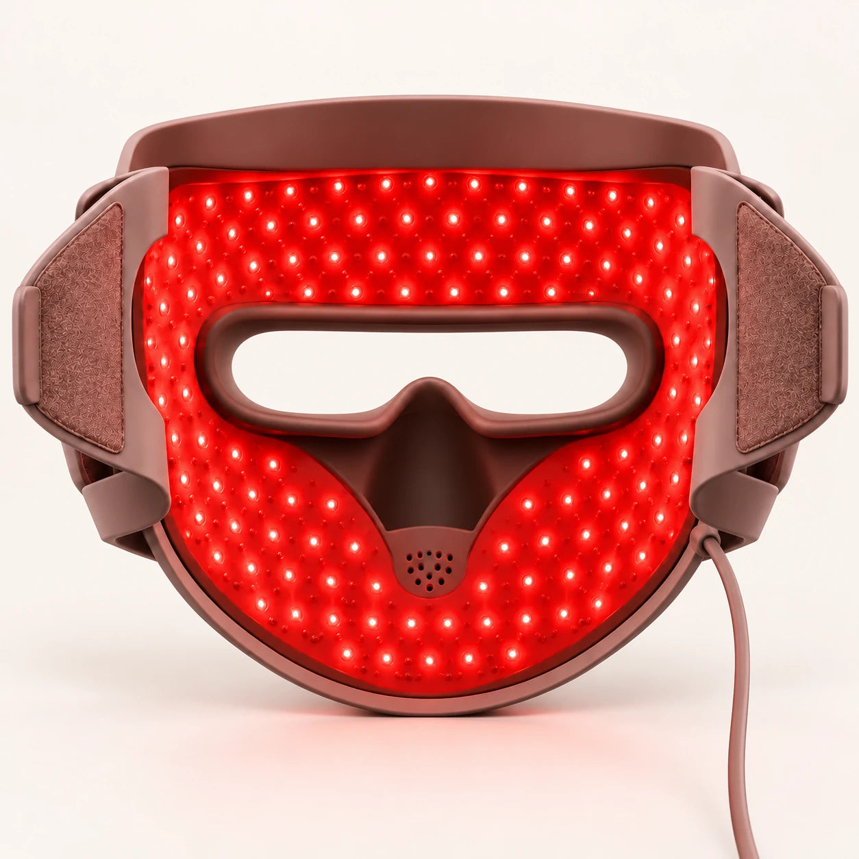The rose-brown mask’s illuminated inner surface